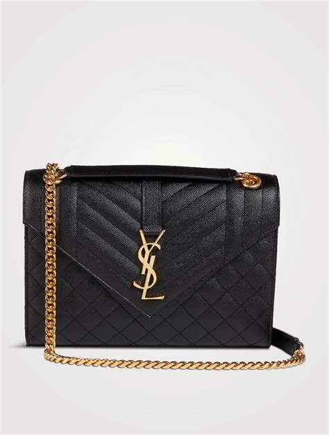 ysl monogram blogger bag in black leather|YSL monogram envelope bag.